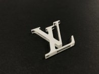 Découpe de logo dans du PMMA teinté blanc